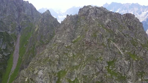 Flying on a throne in the Caucasus mountains Stock Footage 162057321