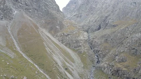 Flying on a throne in the Caucasus mountains Stock Footage 162057596