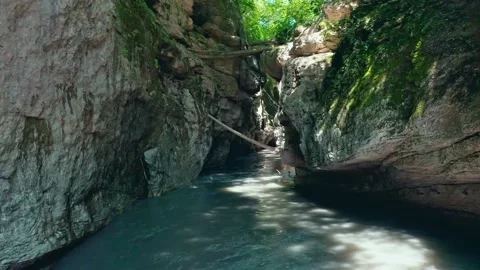 Flying on a throne over a mountain river in a gorge Stock Footage 160605766