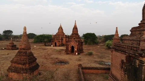 Flying through the Ancient Temples Bagan, Myanmar (Burma) in Morning Light Stock Footage 121927382