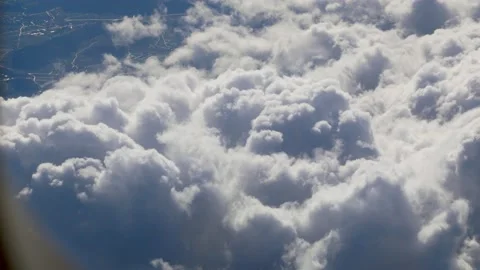 Flying through beautiful thick fluffy clouds. Stock Footage 150071008