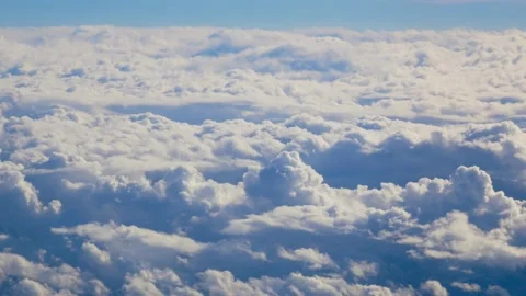 Flying through beautiful thick fluffy clouds. Stock Footage 150071102