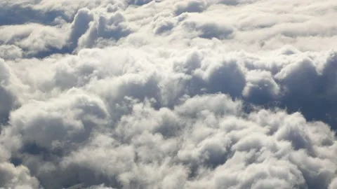Flying through beautiful thick fluffy clouds. Stock Footage 150071206