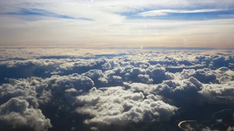 Flying through beautiful thick fluffy clouds. Stock Footage 150071344