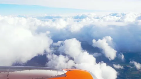 Flying through beautiful thick fluffy clouds. Stock Footage 150072120