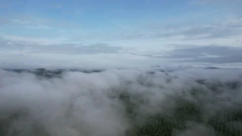 Flying through beautiful thick fluffy clouds. Amazing timelapse of soft white cl Stock Footage 164595596