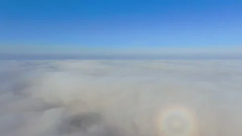 Flying through beautiful thick fluffy clouds. Amazing timelapse of soft white Stock Footage 165336918