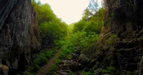 Flying through a big cave drone video Stock-Footage 308247383