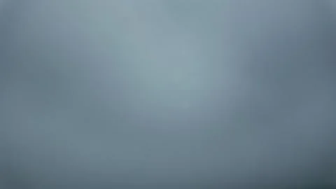 Flying Through Broken Clouds in a Blue Sky Over a Rural Landscape. Stock Footage 333013691