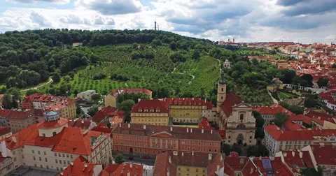 Flying through the center of old Prague, Czech Republic towards Petrin garden. Stock Footage 61085941