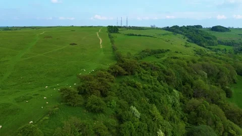 Flying through Cheltenham fields with the cleeve radio towers in the background Video stock 275626383