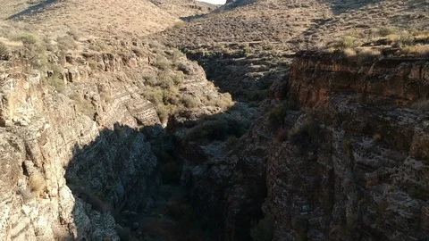 Flying through cliffs - drone shot Stock Footage 107879128
