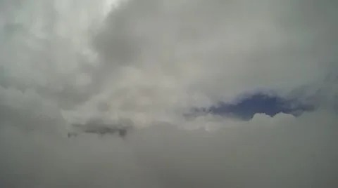 Flying through clouds 2.c Stockbeeldmateriaal 21240631