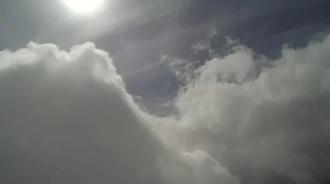 Flying through clouds 3.a Stockbeeldmateriaal 21234455