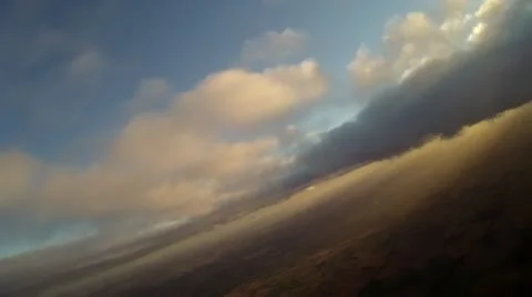 Flying through clouds 7.a Stockbeeldmateriaal 21240899