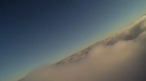 Flying through clouds 7.b Stockbeeldmateriaal 21241181