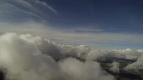 Flying through clouds 9.a Stockbeeldmateriaal 21294853