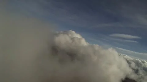 Flying through clouds 9.b Stockbeeldmateriaal 21295405