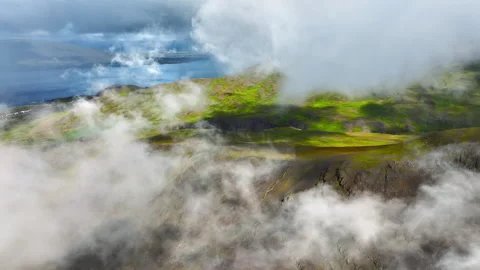 Flying Through Clouds Above Green Hills, Paradise Heaven Mountain Range with Vidéo 254183493
