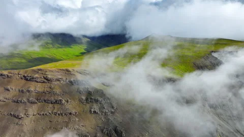 Flying Through Clouds Above Green Hills, Paradise Heaven Mountain Range with Vidéo 254183633