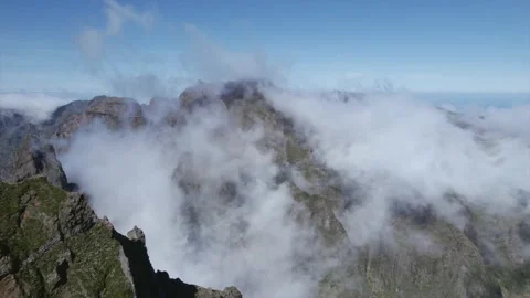 Flying Through Clouds Above Mountain Natural Landscape 4K Video stock 171250422