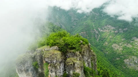 Flying through clouds above mountain forest, Morning mist Aerial view, Wonderful Stock Footage 197654902
