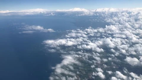 Flying through clouds above the sea Stock Footage 198651167