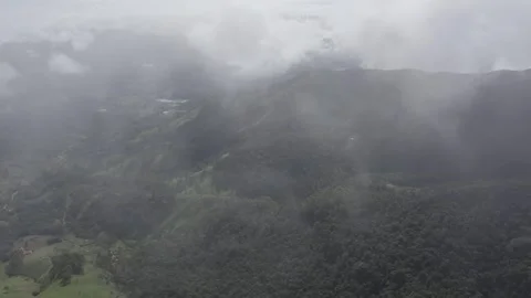 Flying through clouds above Tres Picos national park natural landscape in Rio de 스톡 동영상 251039854