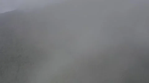 Flying through clouds above Tres Picos State Park natural landscape, mountain Видео 251048568