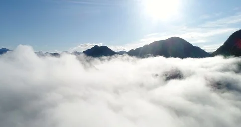 Flying through the clouds, Austrian Alps Stock Footage 98838044