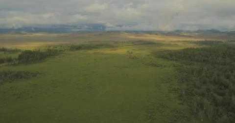 Flying through clouds with beautiful landscape view over the mountains. Stock Footage 62222170