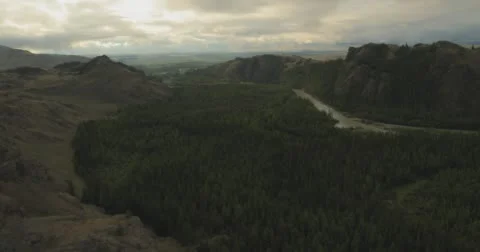 Flying through clouds with beautiful landscape view over the mountains. Stock Footage 62222623