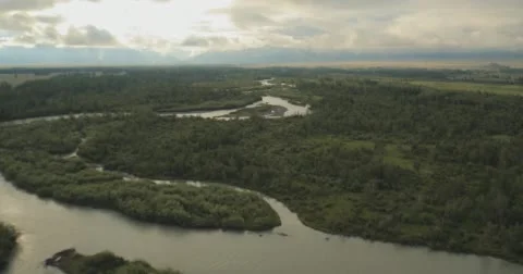Flying through clouds with beautiful landscape view over the mountains. Stock Footage 62222831