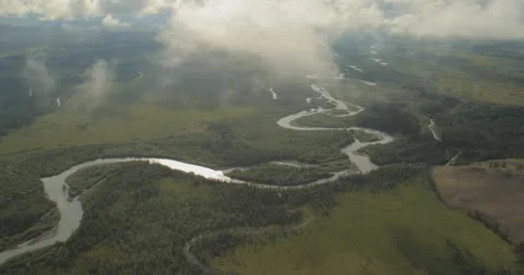 Flying through clouds with beautiful landscape view over the mountains. Stock Footage 62230522