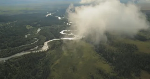 Flying through clouds with beautiful landscape view over the mountains. Stock Footage 62239271