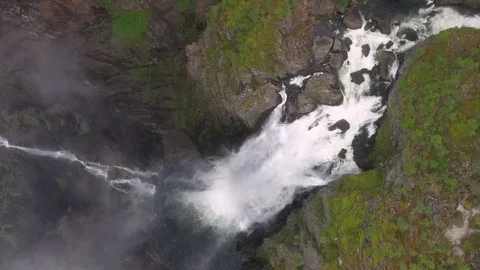 Flying through clouds to the beautiful Voringsfossen Waterfall, Norway Stock Footage 114067468