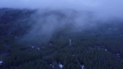 Flying Through Clouds in Colorado Mountains Video stock 82920008