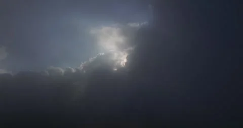 Flying through clouds during sunset light over Munduk village in Bali Stock Footage 248755485