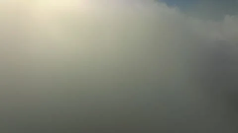 Flying through clouds during sunset light over Munduk village in Bali Vidéo 254840820