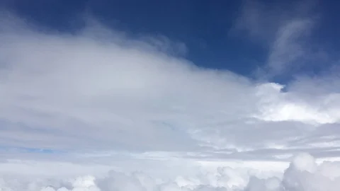 Flying through the clouds Stock Footage 128883913