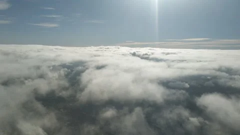Flying through clouds Stock Footage 136260891