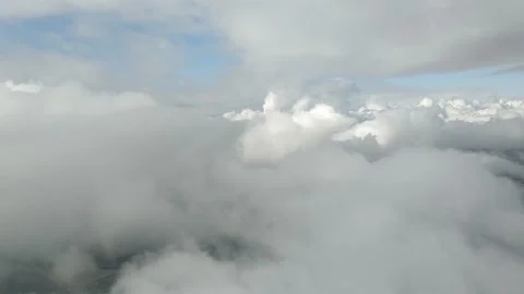 Flying through clouds Stock Footage 136261883