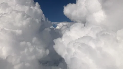 Flying through the clouds in a Jet Stock Footage 87245839