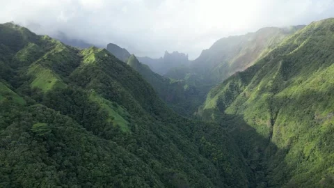 Flying through the clouds on Mount Aorai, Tahiti French Polynesia Stock Footage 253172144