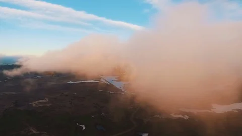 Flying through the clouds to the mountains. Beautiful flight through the clouds Stock Footage 72995682