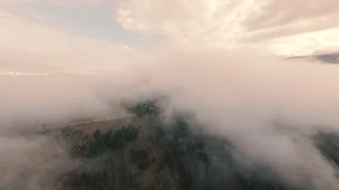 Flying Through Clouds Over Autumn Forest - FPV Drone Cinematic Shot Stock Footage 328105970
