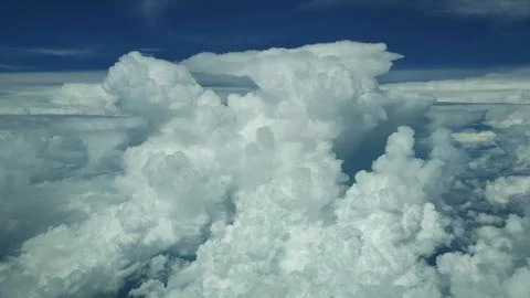 Flying through clouds Stock Photos