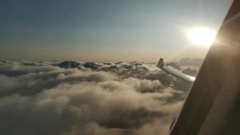 Flying through clouds Stock Photos