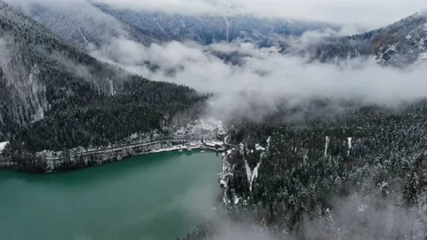 Flying through the clouds in Ritsa lake, Abkhazia Stock Footage 201871104
