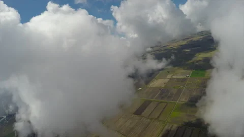 Flying through clouds toward farm lands Northern Ca. Vídeo Stock 240414841